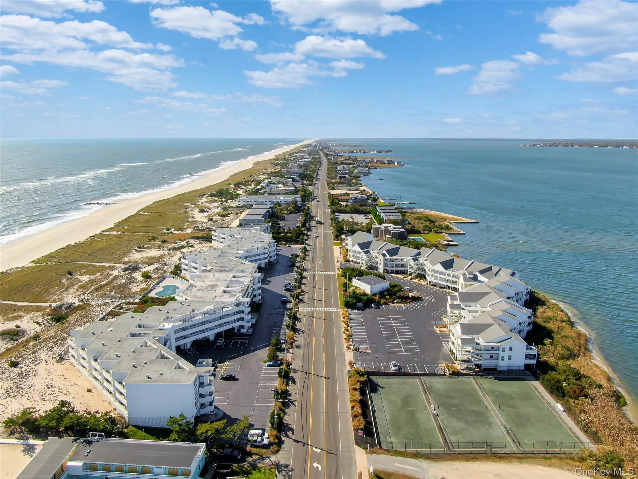Aerial view of waterfront with a beach Aerial view of waterfront with a beach