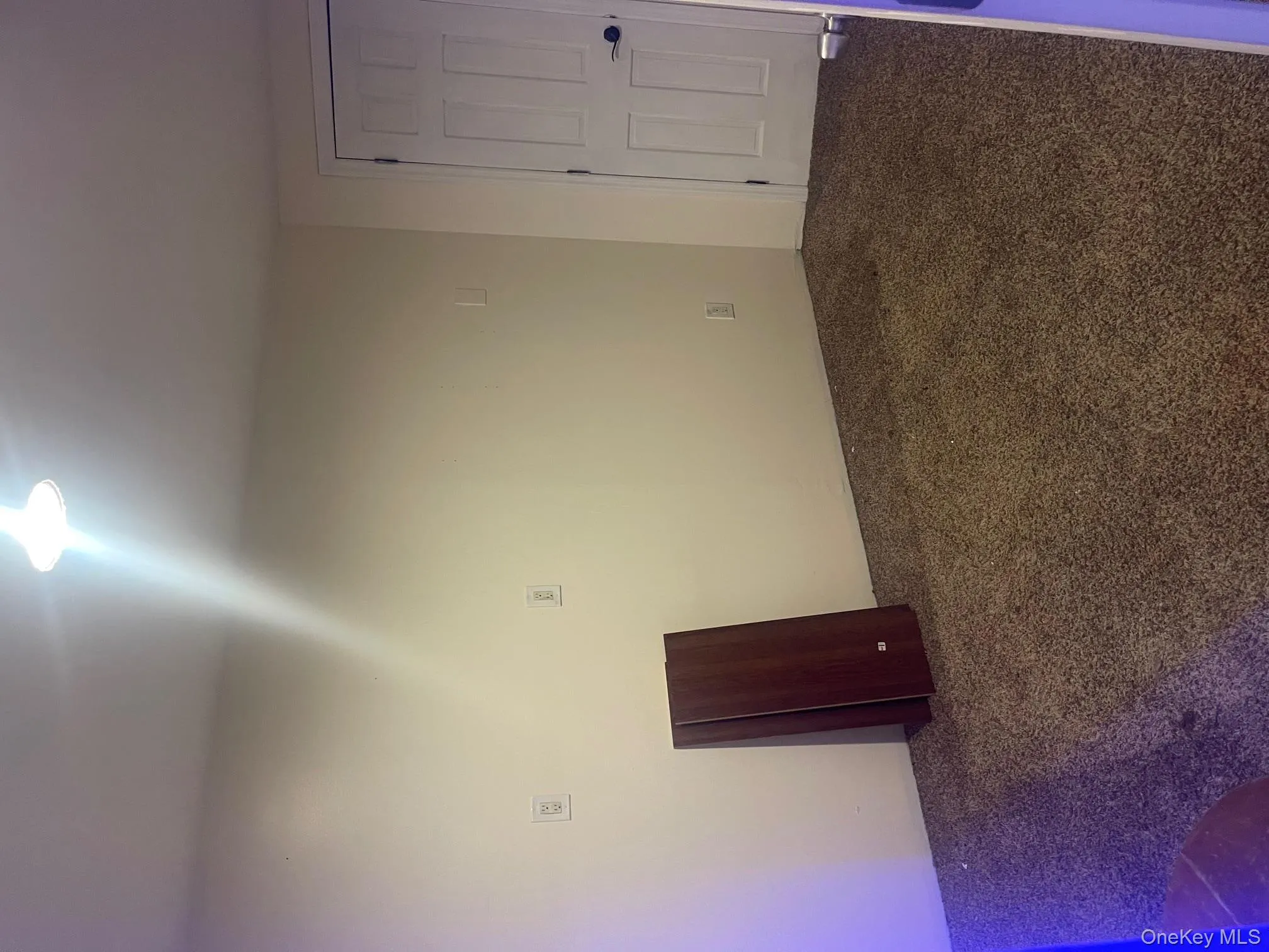 View of carpeted empty room View of carpeted empty room