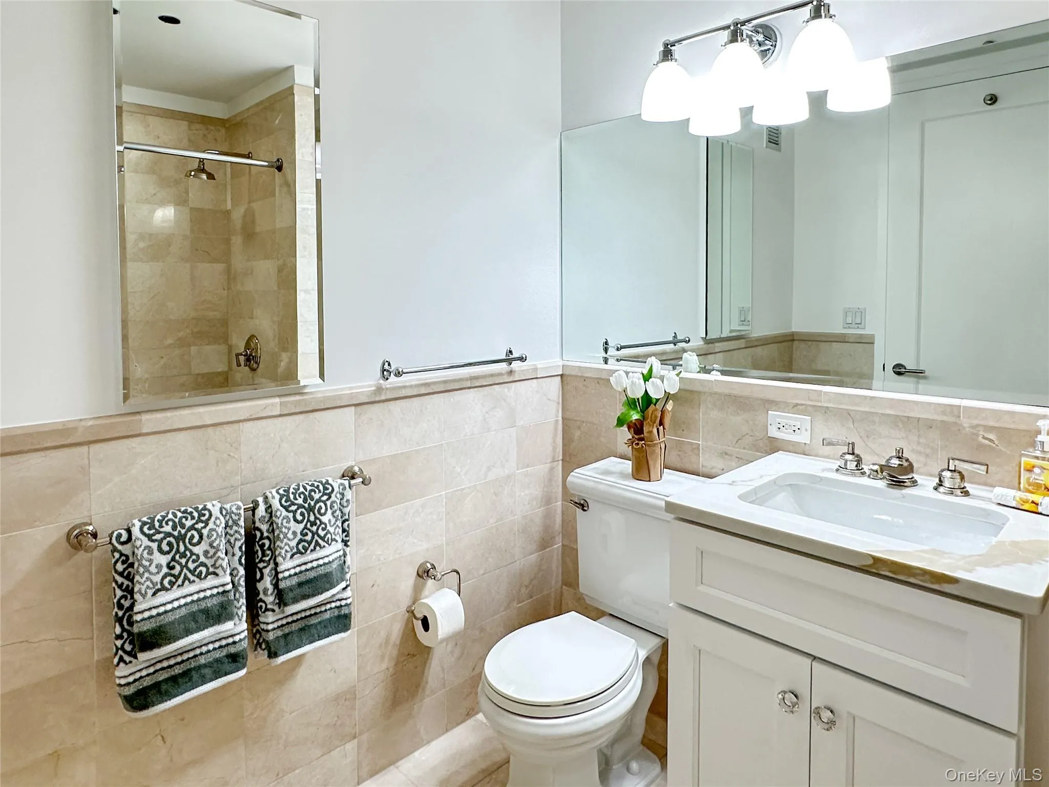 2nd bathroom with a shower / tub, brand new vanity and quartz top, and tile walls 2nd bathroom with a shower / tub, brand new vanity and quartz top, and tile walls