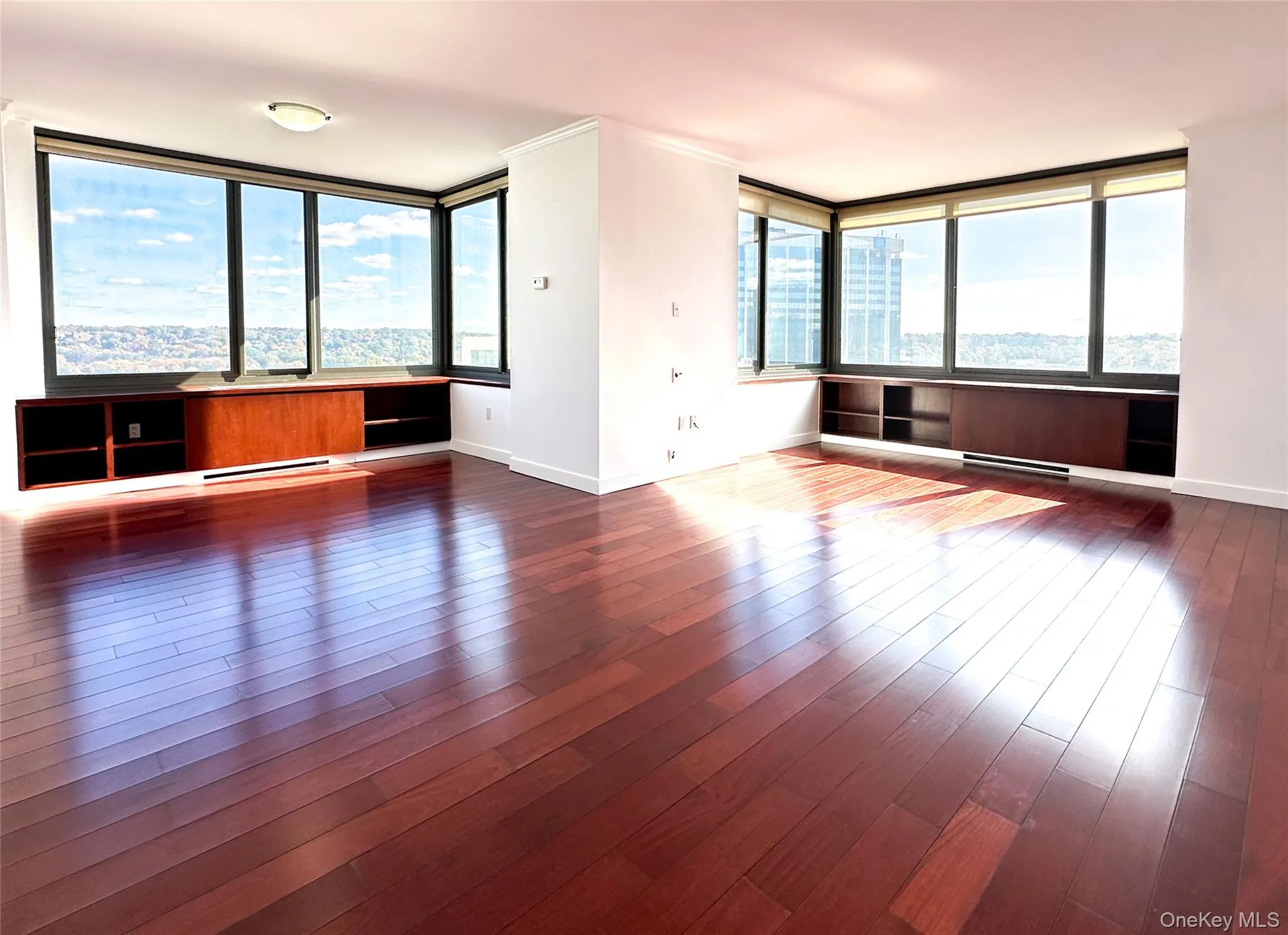 Living room / dining room; oversized windows with picturesque view; brand new solar shades coming soon! Living room / dining room; oversized windows with picturesque view; brand new solar shades coming soon!