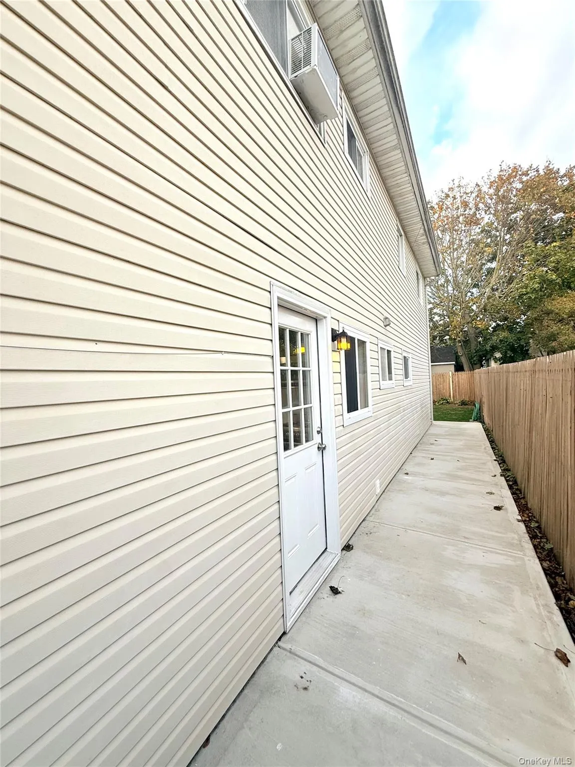 View of home's exterior featuring a patio View of home's exterior featuring a patio