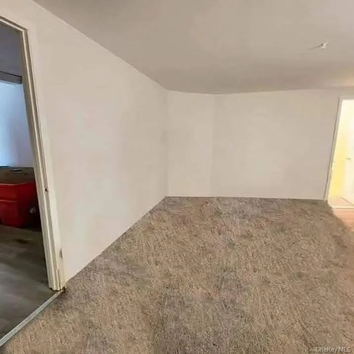 View of carpeted empty room View of carpeted empty room