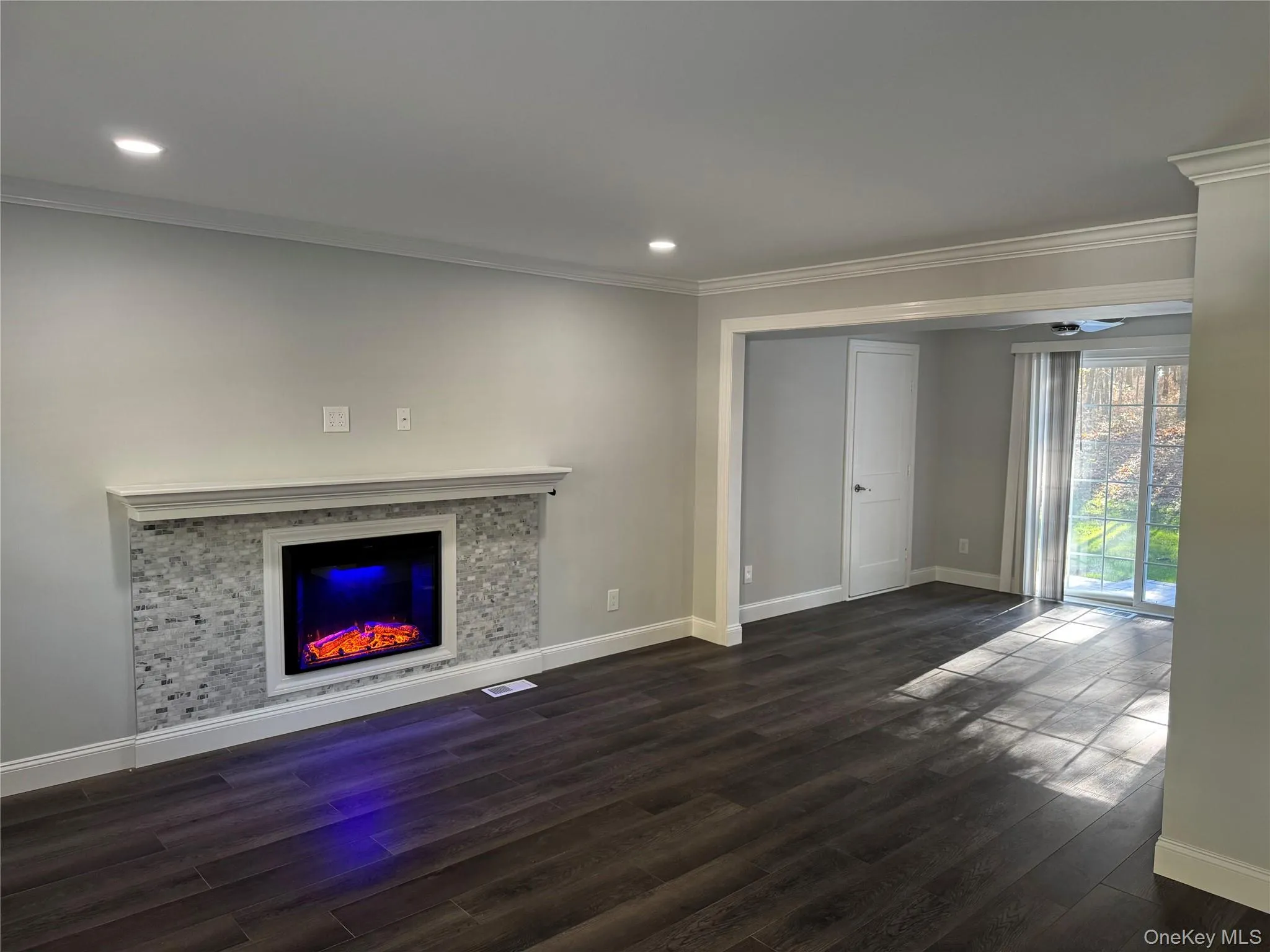 Stone Front Electric Fireplace with Custom Made Mantel, New Luxury Flooring Throughout Stone Front Electric Fireplace with Custom Made Mantel, New Luxury Flooring Throughout