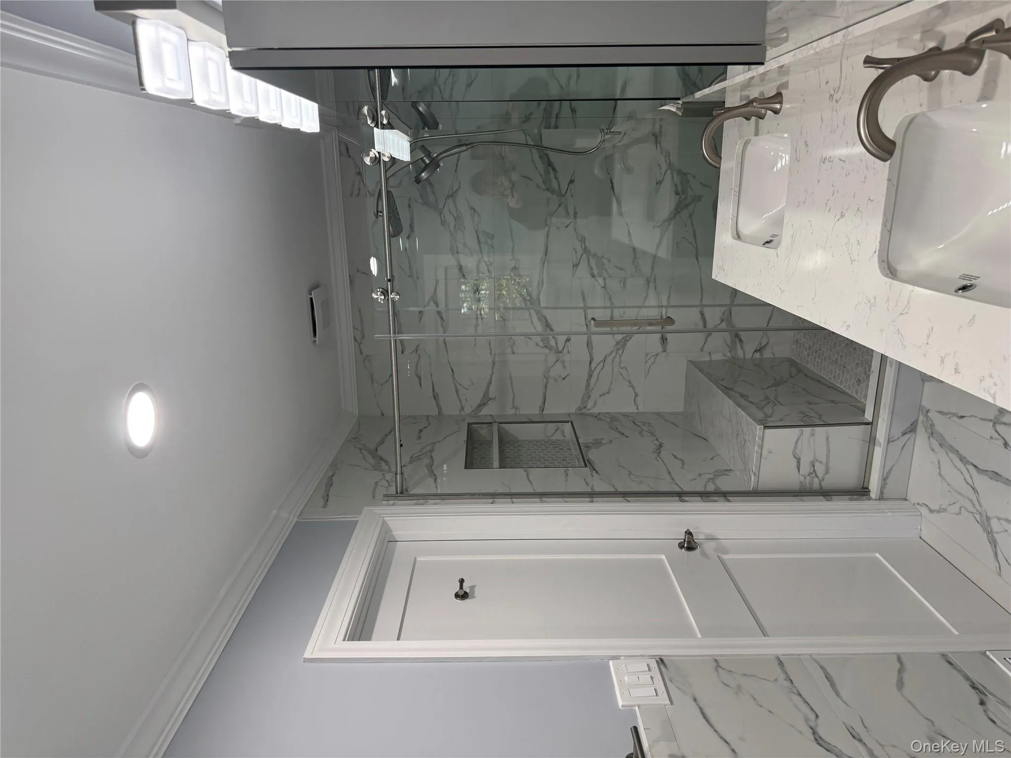 Barn Style Glass Doors, Porcelain Seated Spa Shower with Dual shower heads. Get Ready to Enjoy and Relax! Barn Style Glass Doors, Porcelain Seated Spa Shower with Dual shower heads. Get Ready to Enjoy and Relax!