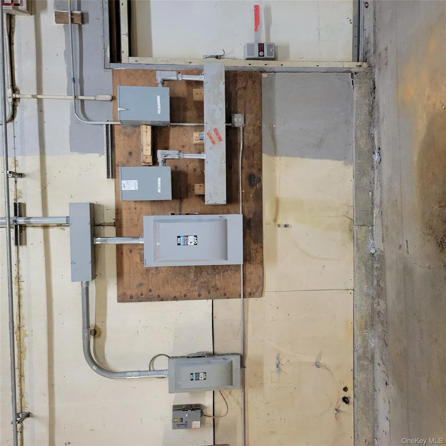 Utility room featuring electric panel Utility room featuring electric panel