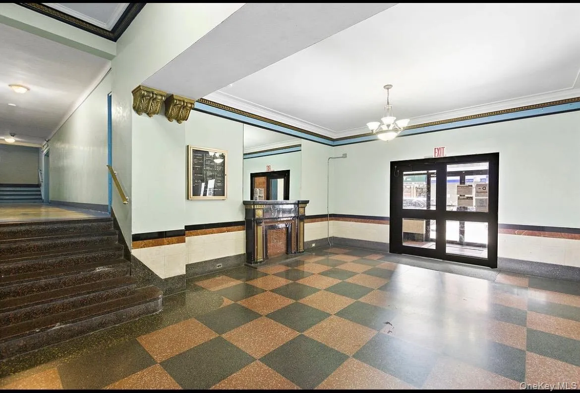 Building lobby with crown molding and wainscoting Building lobby with crown molding and wainscoting