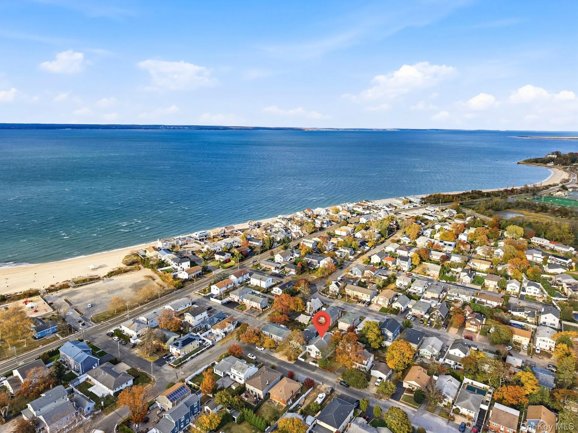 Aerial overview of property's location with nearby suburban area Aerial overview of property's location with nearby suburban area