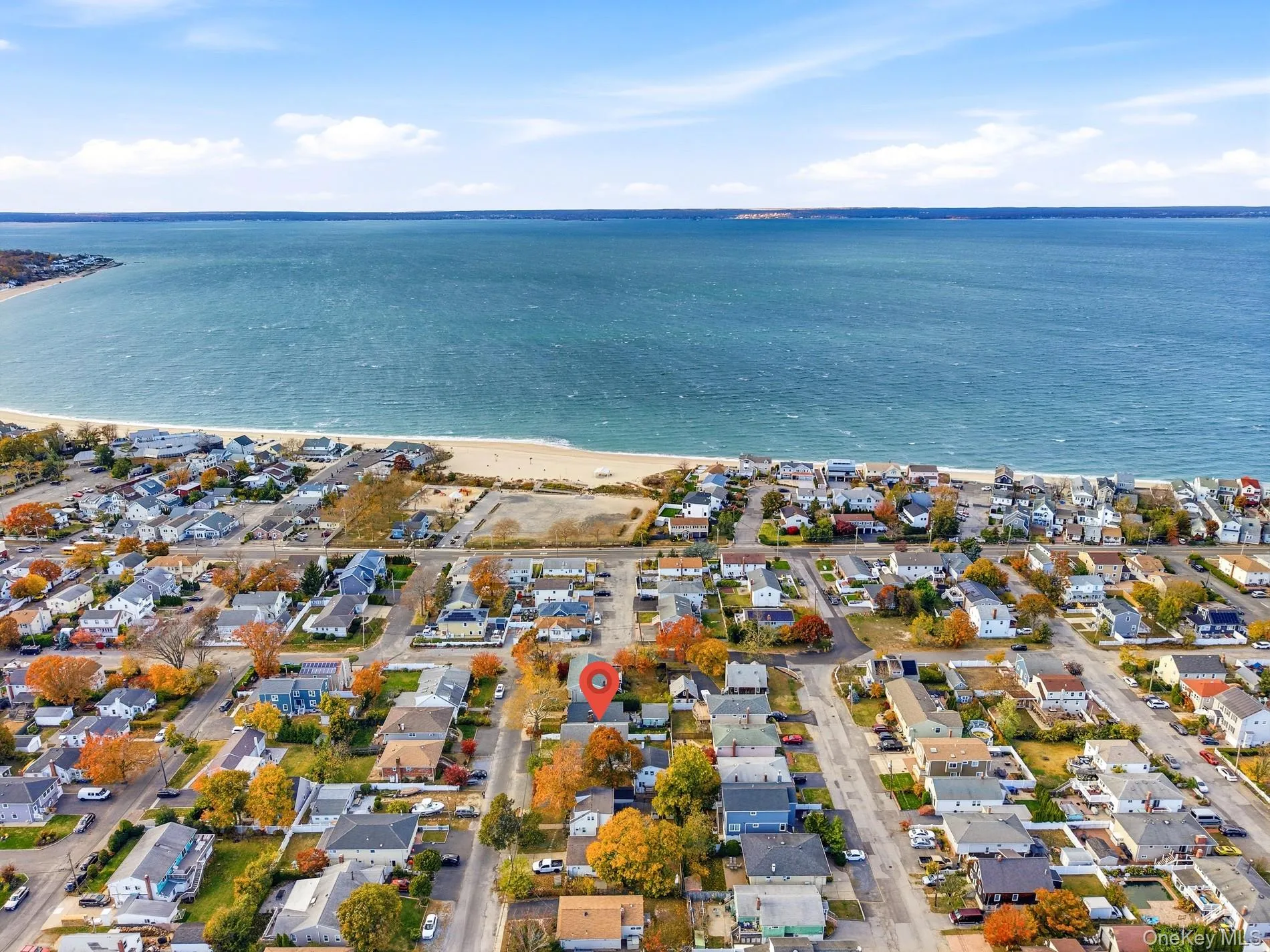 Aerial view of property and Soundside Beach Aerial view of property and Soundside Beach