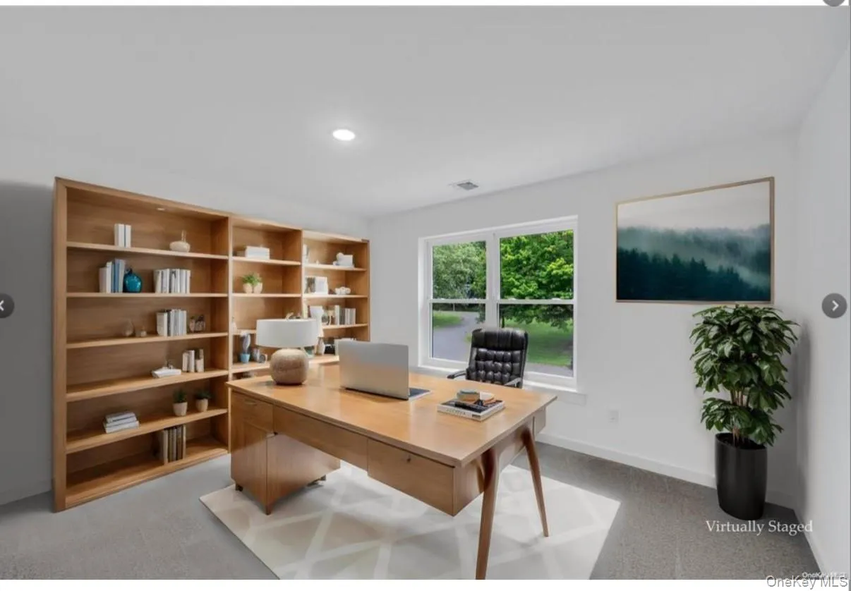 Home office featuring light carpet and recessed lighting Home office featuring light carpet and recessed lighting