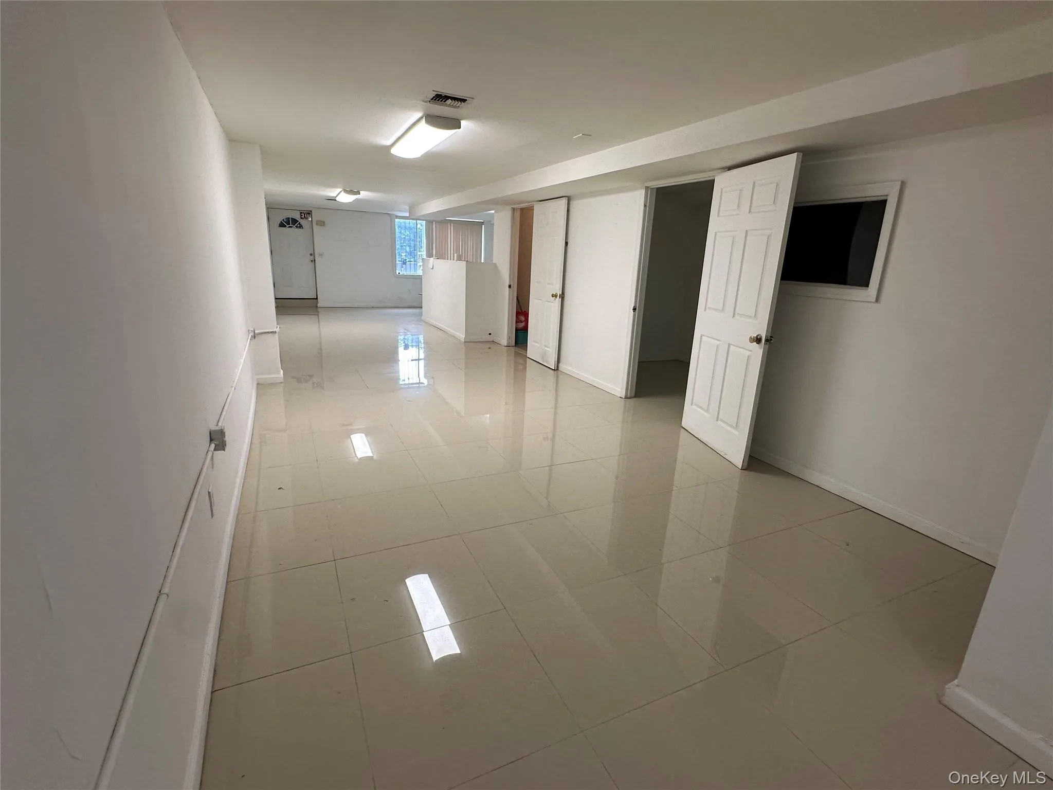 Spare room with light tile patterned floors Spare room with light tile patterned floors