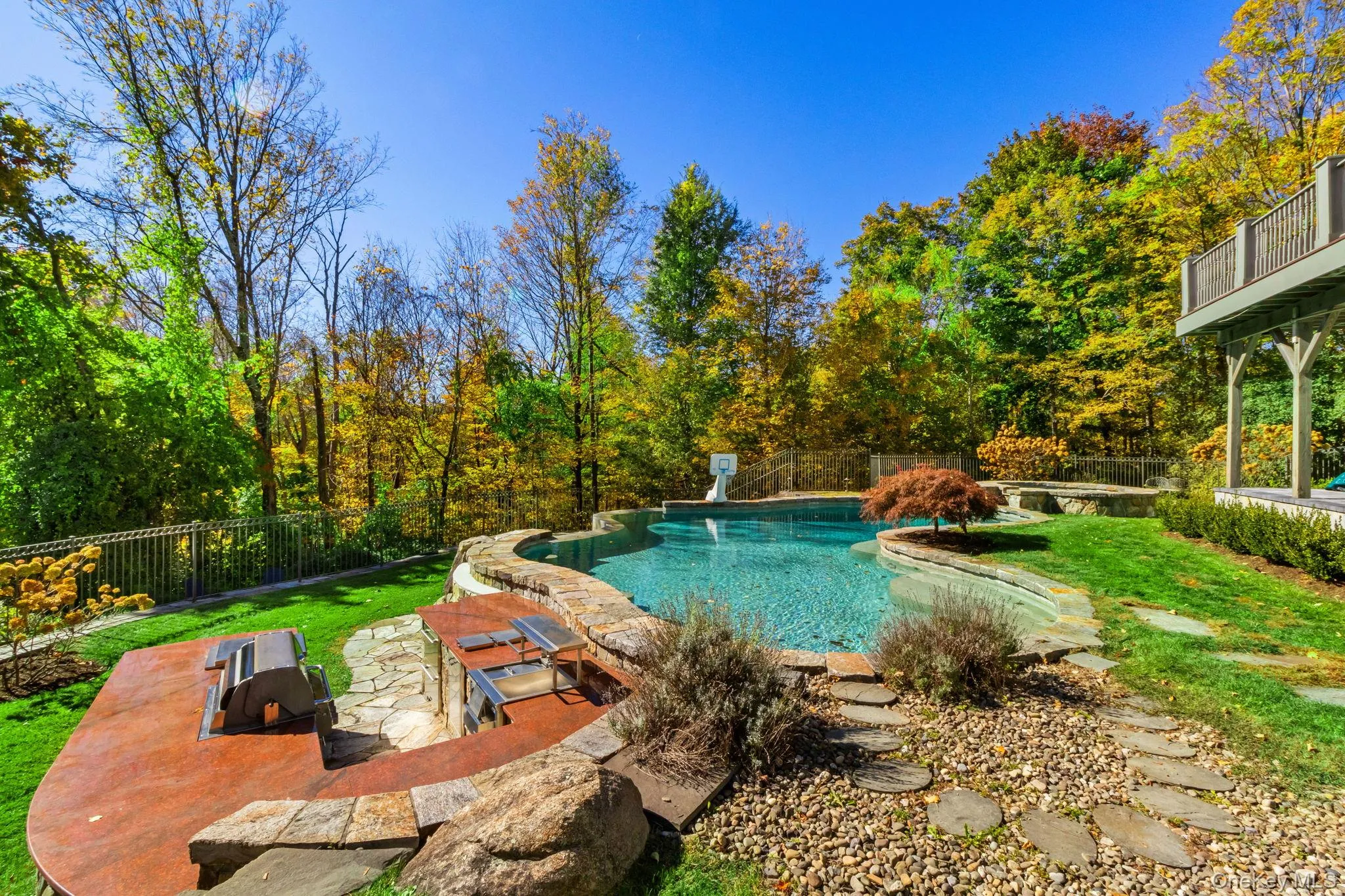 View of pool with a patio and a fenced backyard View of pool with a patio and a fenced backyard