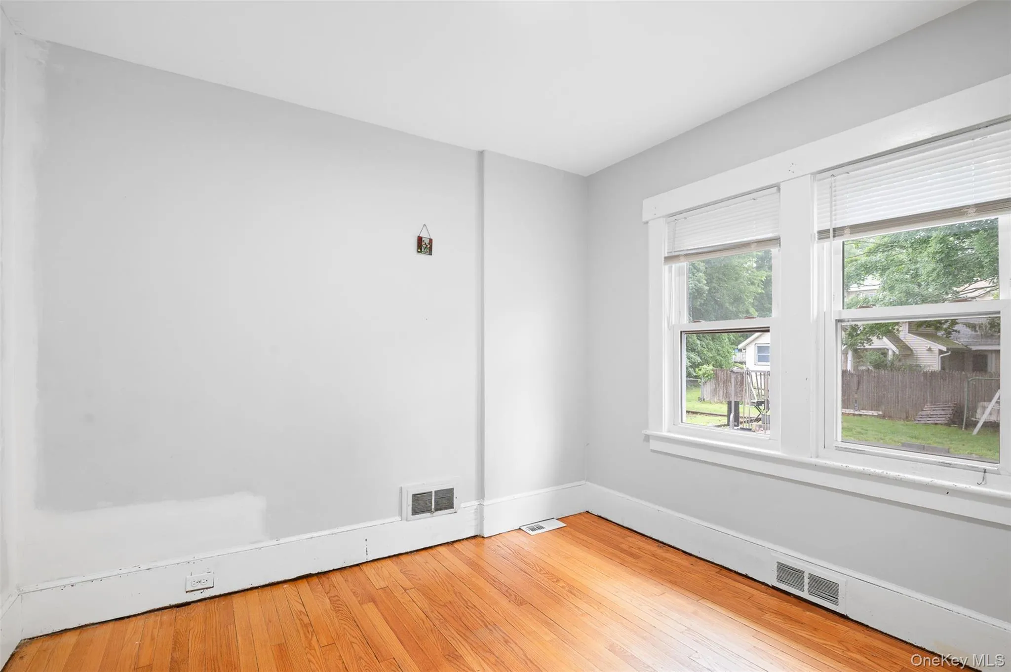 Spare room with light wood-style floors Spare room with light wood-style floors