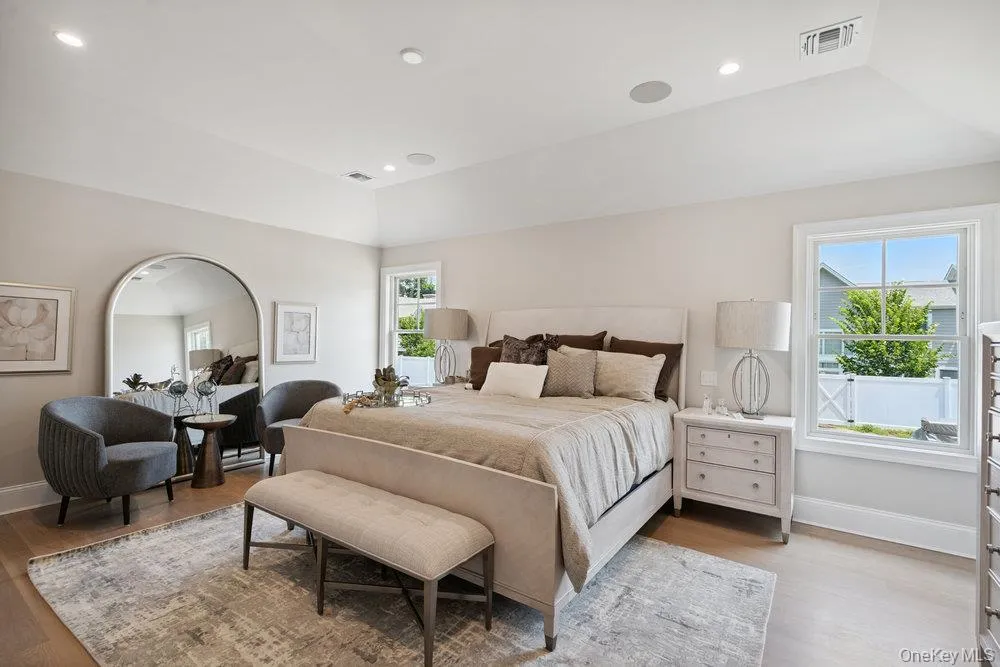 Bedroom featuring recessed lighting and light wood-style floors Bedroom featuring recessed lighting and light wood-style floors