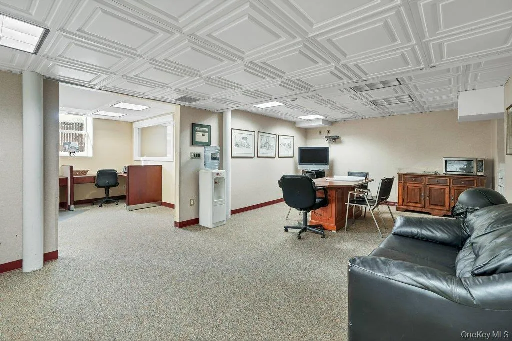 Home office with an ornate ceiling Home office with an ornate ceiling