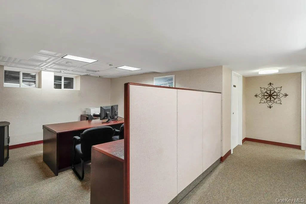 Home office featuring light colored carpet Home office featuring light colored carpet