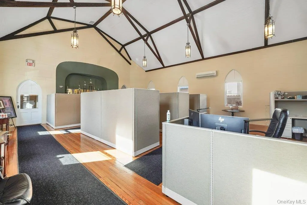 Welcome area with high vaulted ceiling Welcome area with high vaulted ceiling