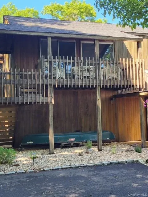 View of front of house with a balcony View of front of house with a balcony