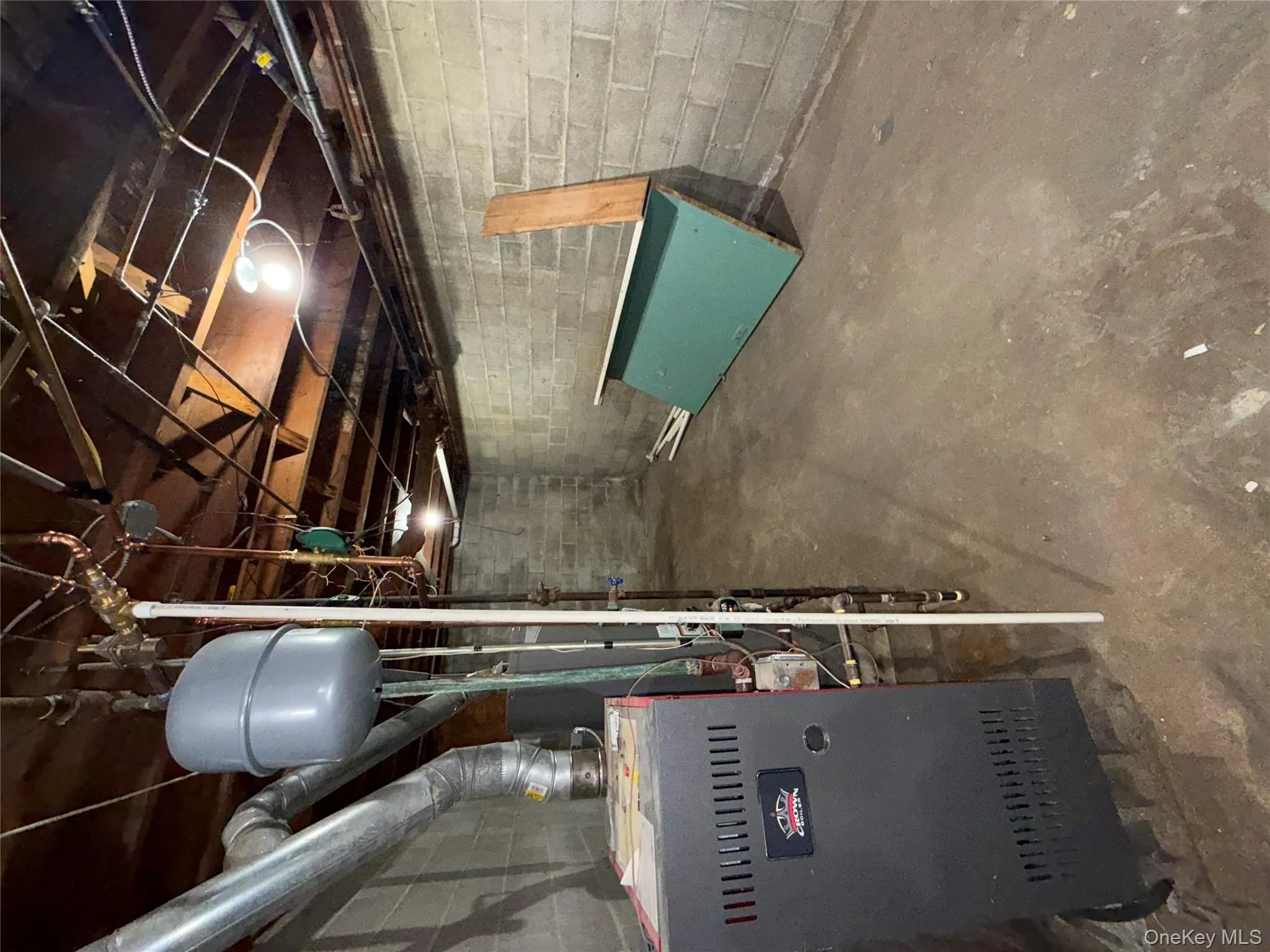 Unfinished basement with a heating unit Unfinished basement with a heating unit