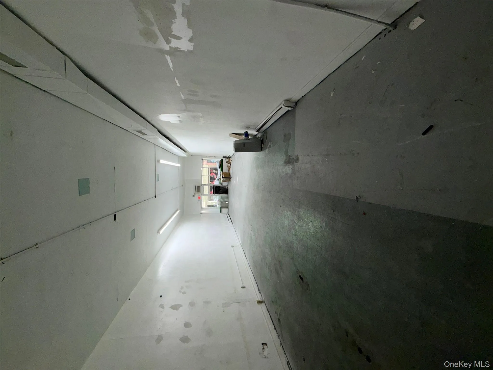 Garage with a baseboard heating unit Garage with a baseboard heating unit