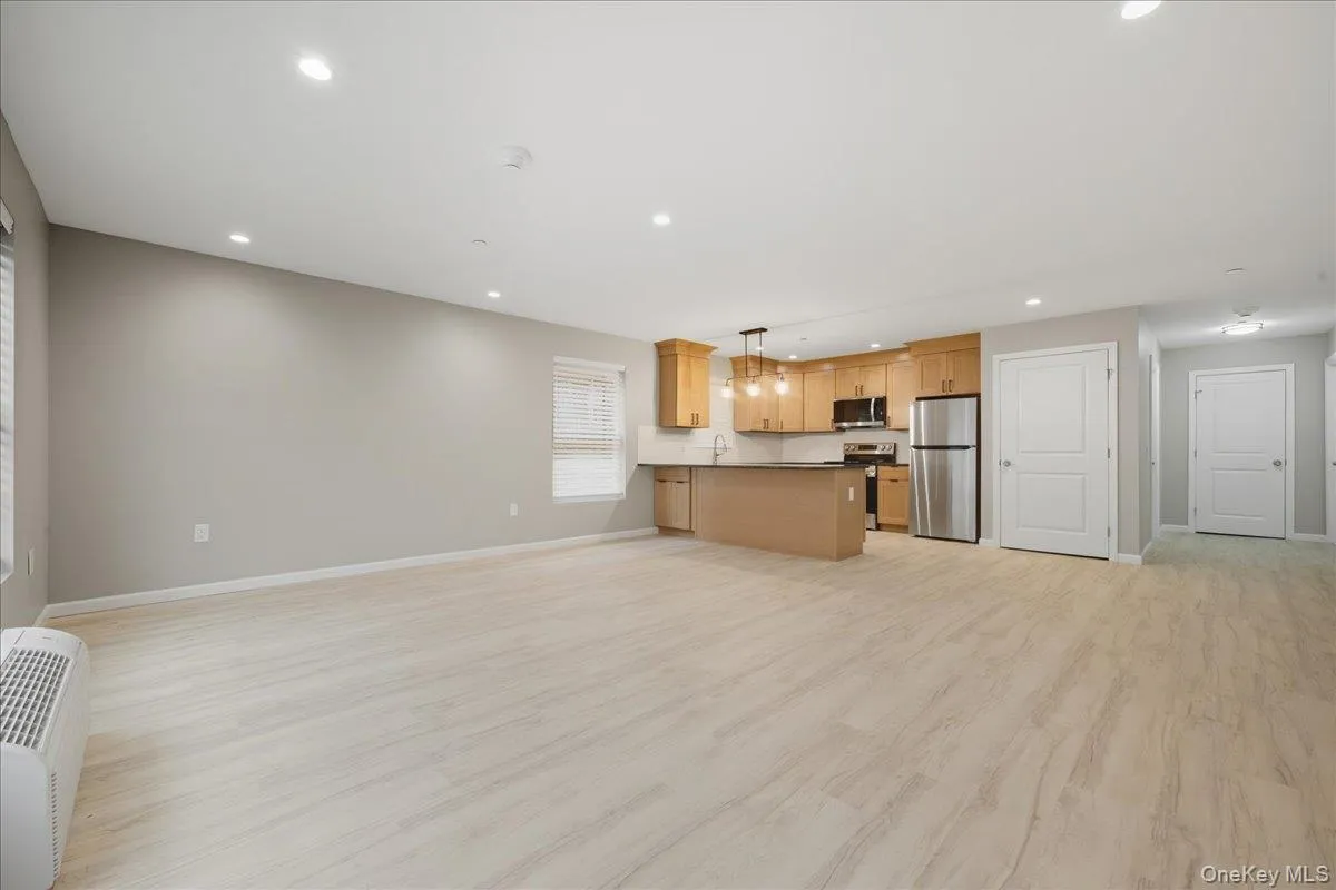 Spacious Open Floor Plan w/Potential For Dining Area Or Office. Features Luxury Vinyl Plank Floors and Recessed Lighting. Spacious Open Floor Plan w/Potential For Dining Area Or Office. Features Luxury Vinyl Plank Floors and Recessed Lighting.