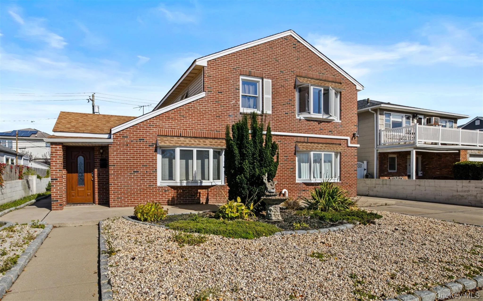 View of front of home with brick siding View of front of home with brick siding