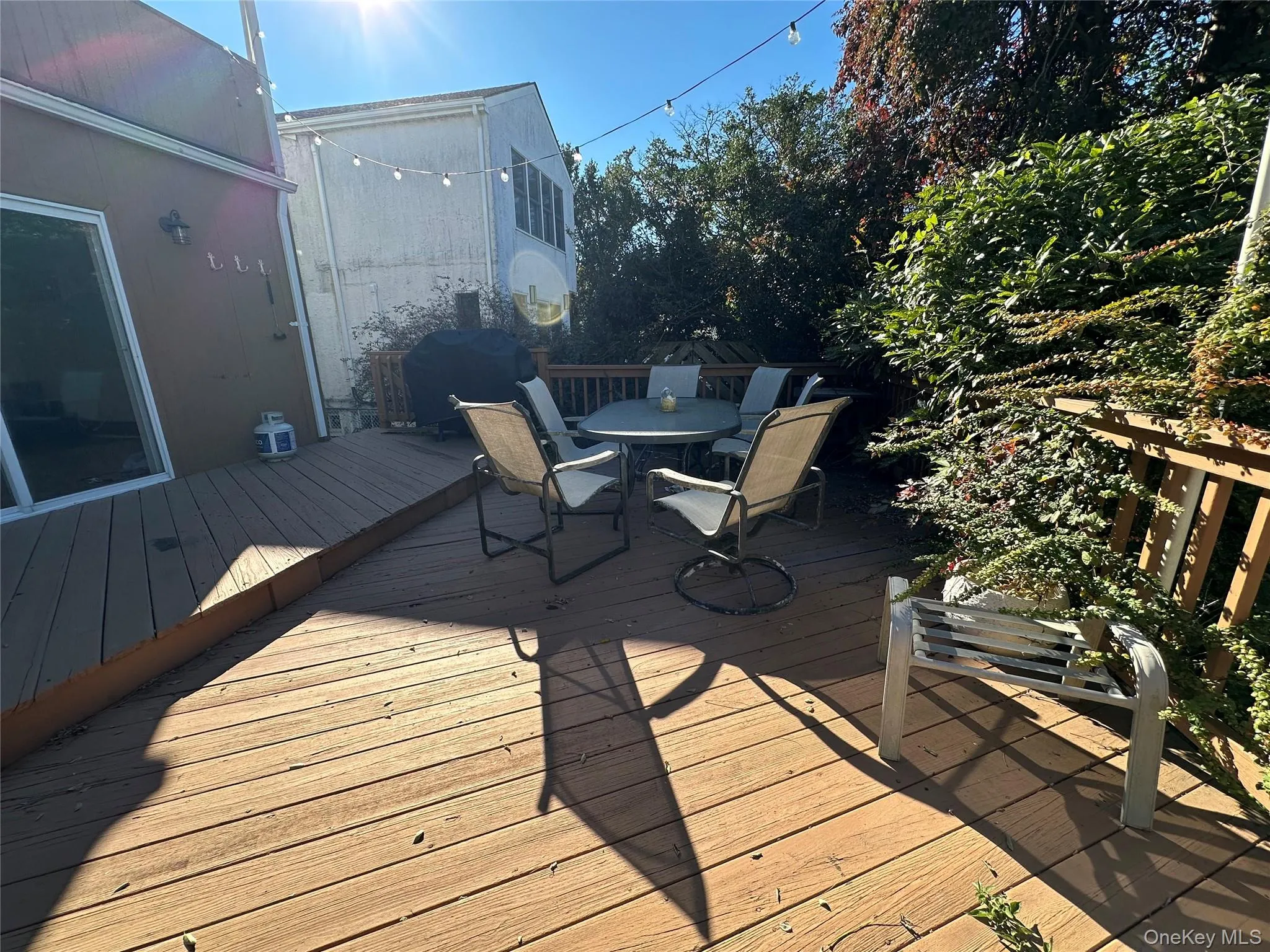 Deck with outdoor dining area Deck with outdoor dining area