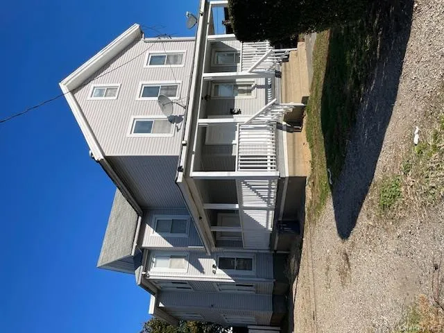 View of front facade featuring a large porch View of front facade featuring a large porch