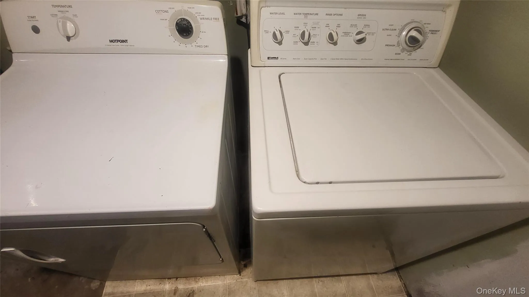Laundry room with separate washer and dryer Laundry room with separate washer and dryer