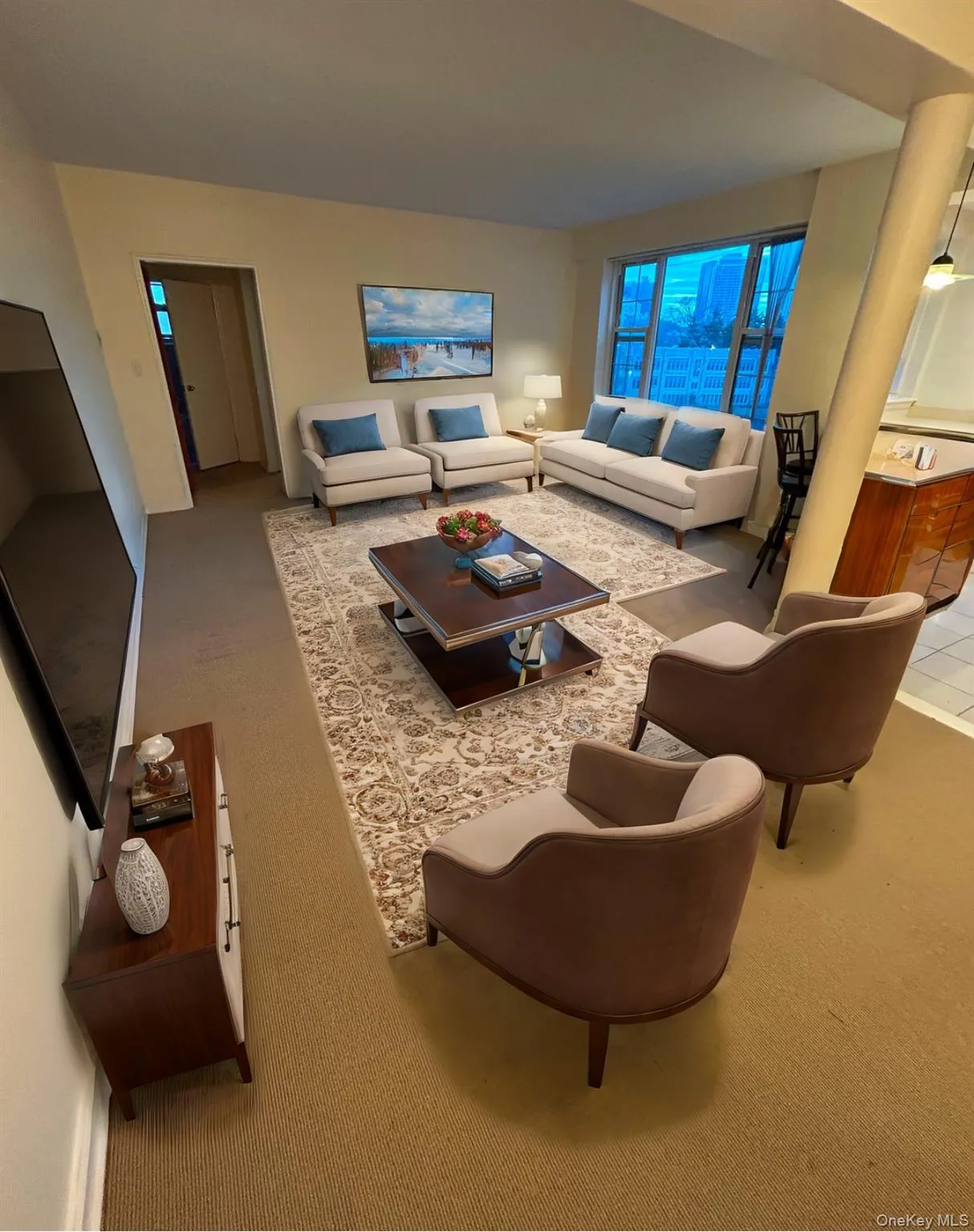 Living room featuring light colored carpet Living room featuring light colored carpet