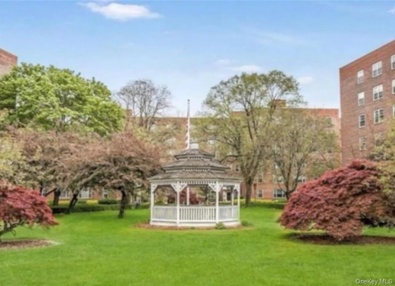 Surrounding community with a gazebo and a yard Surrounding community with a gazebo and a yard