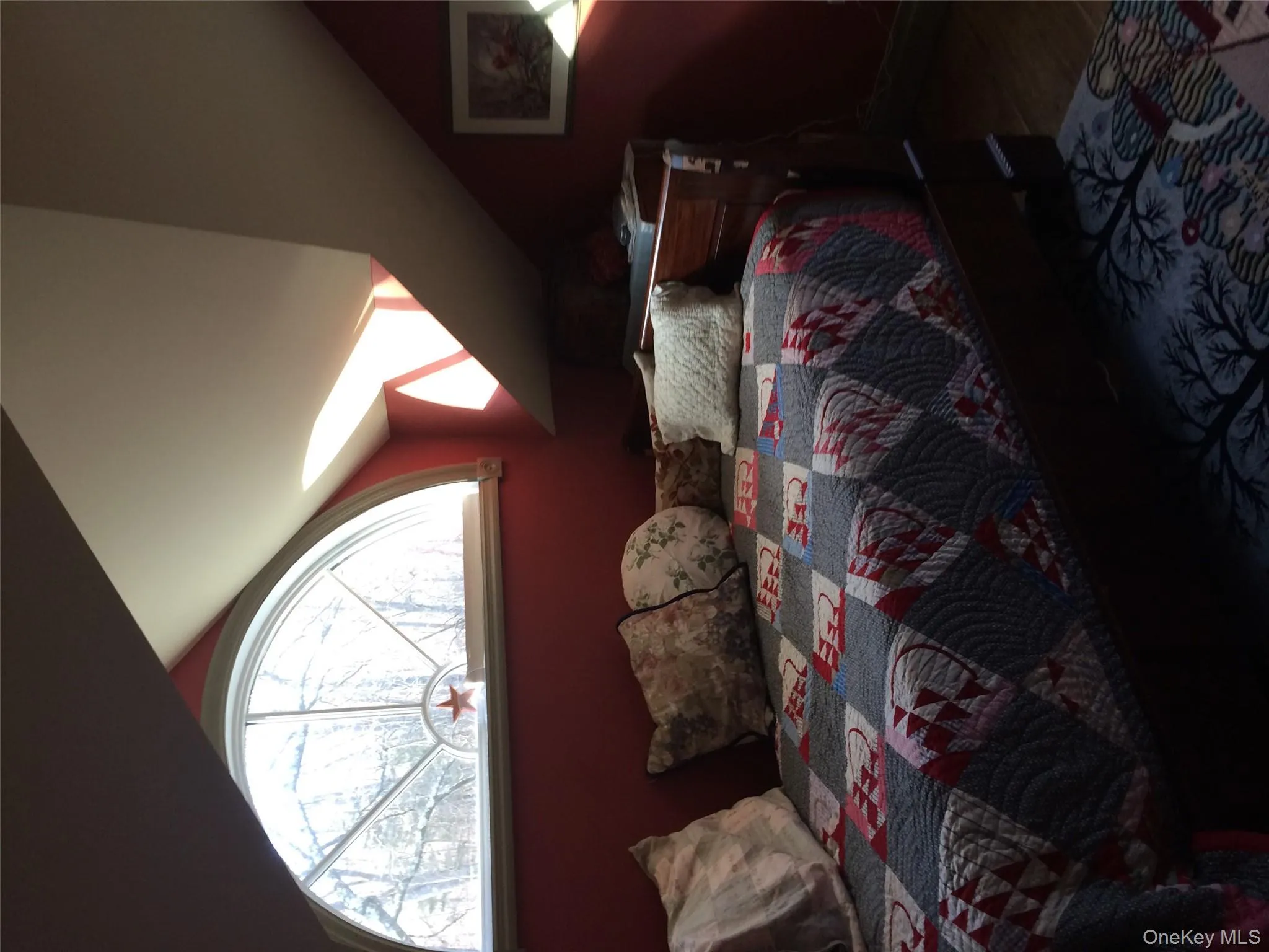 Small 2nd Bedroom featuring lofted ceiling and dark wood-style floors Small 2nd Bedroom featuring lofted ceiling and dark wood-style floors