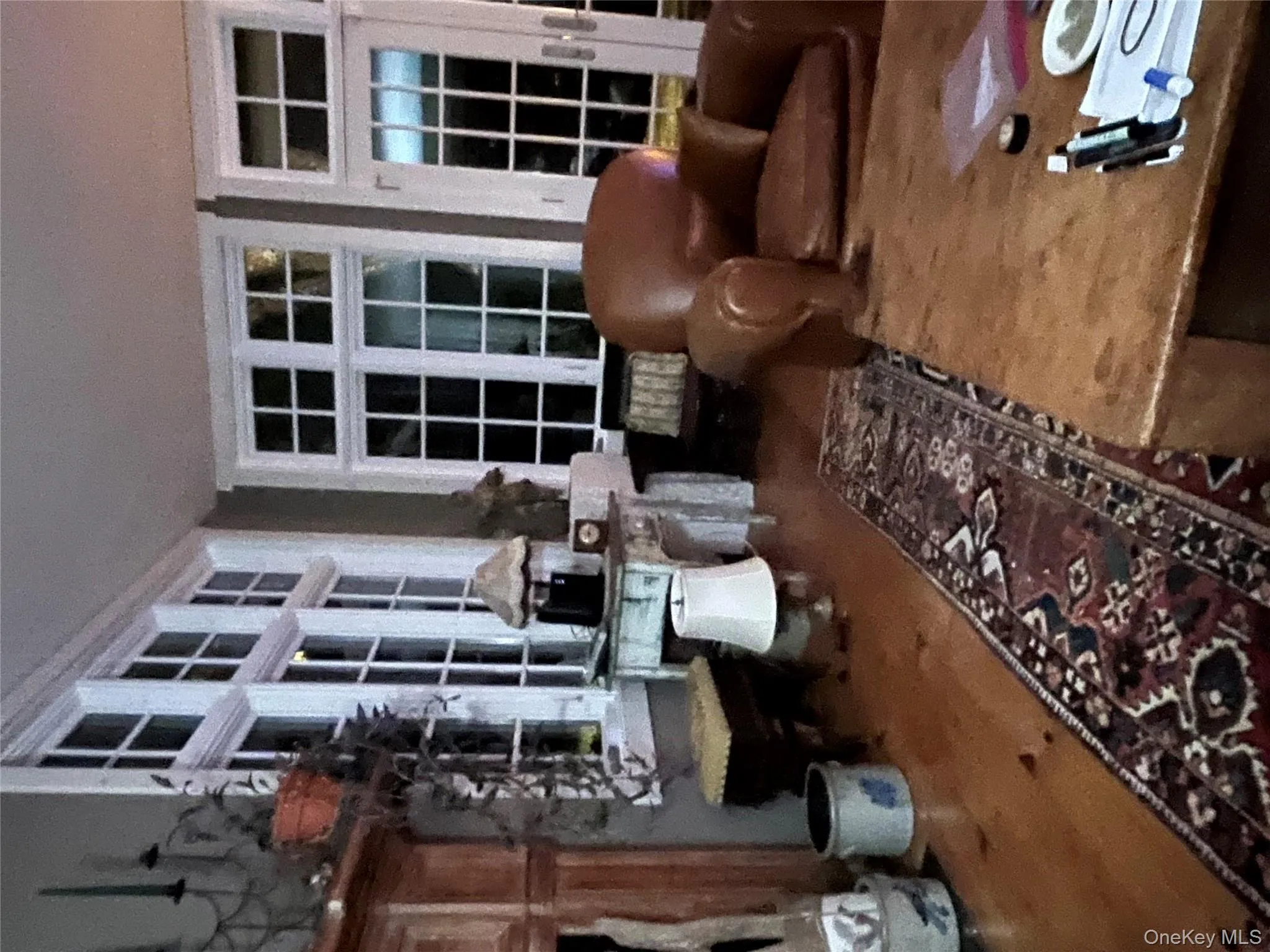 Living area with wood finished floors Living area with wood finished floors