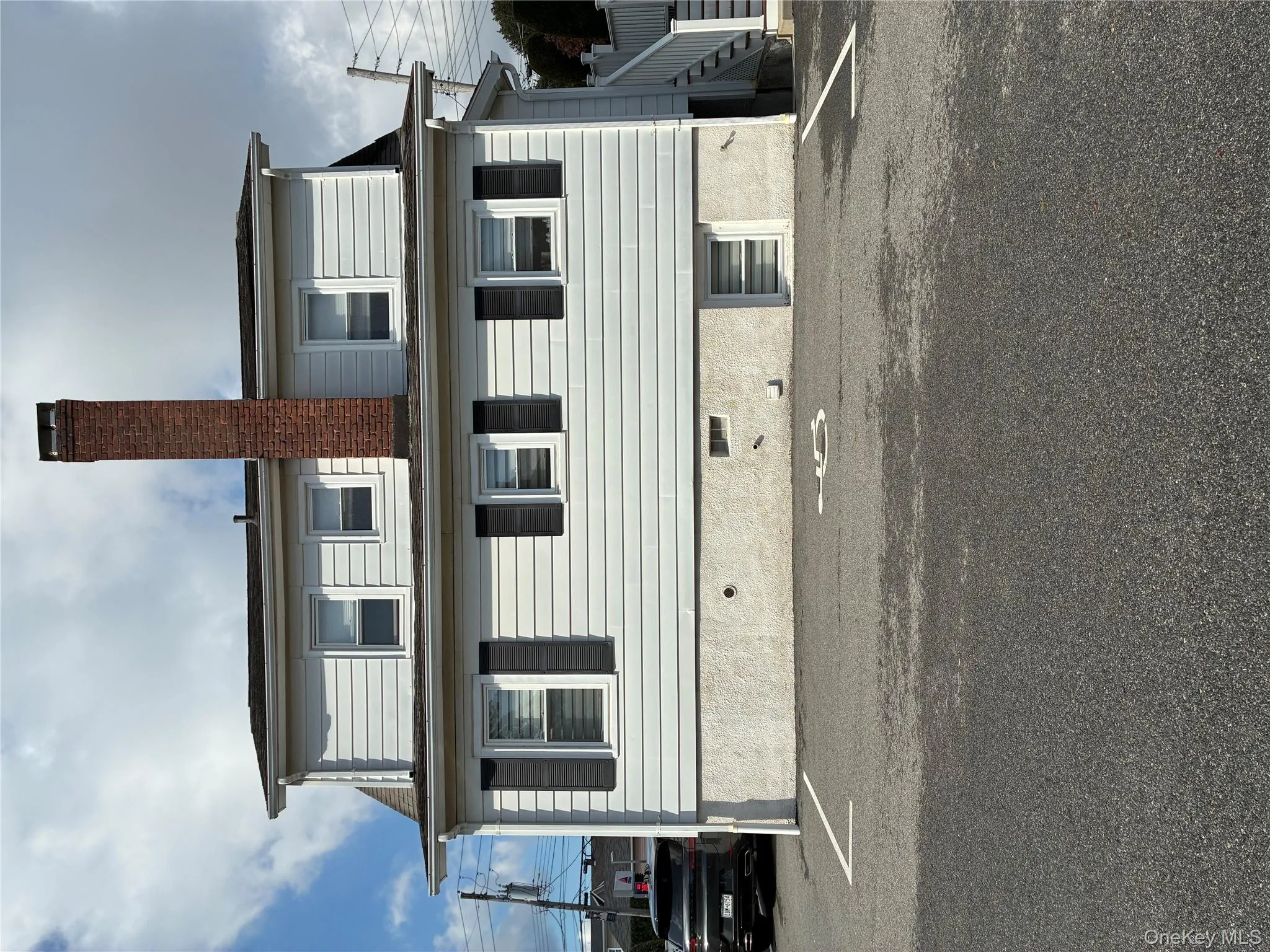 View of side of property with a chimney View of side of property with a chimney