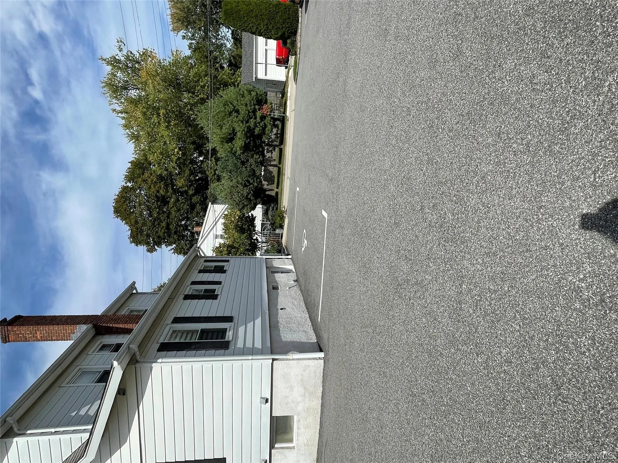 View of property exterior with a chimney View of property exterior with a chimney