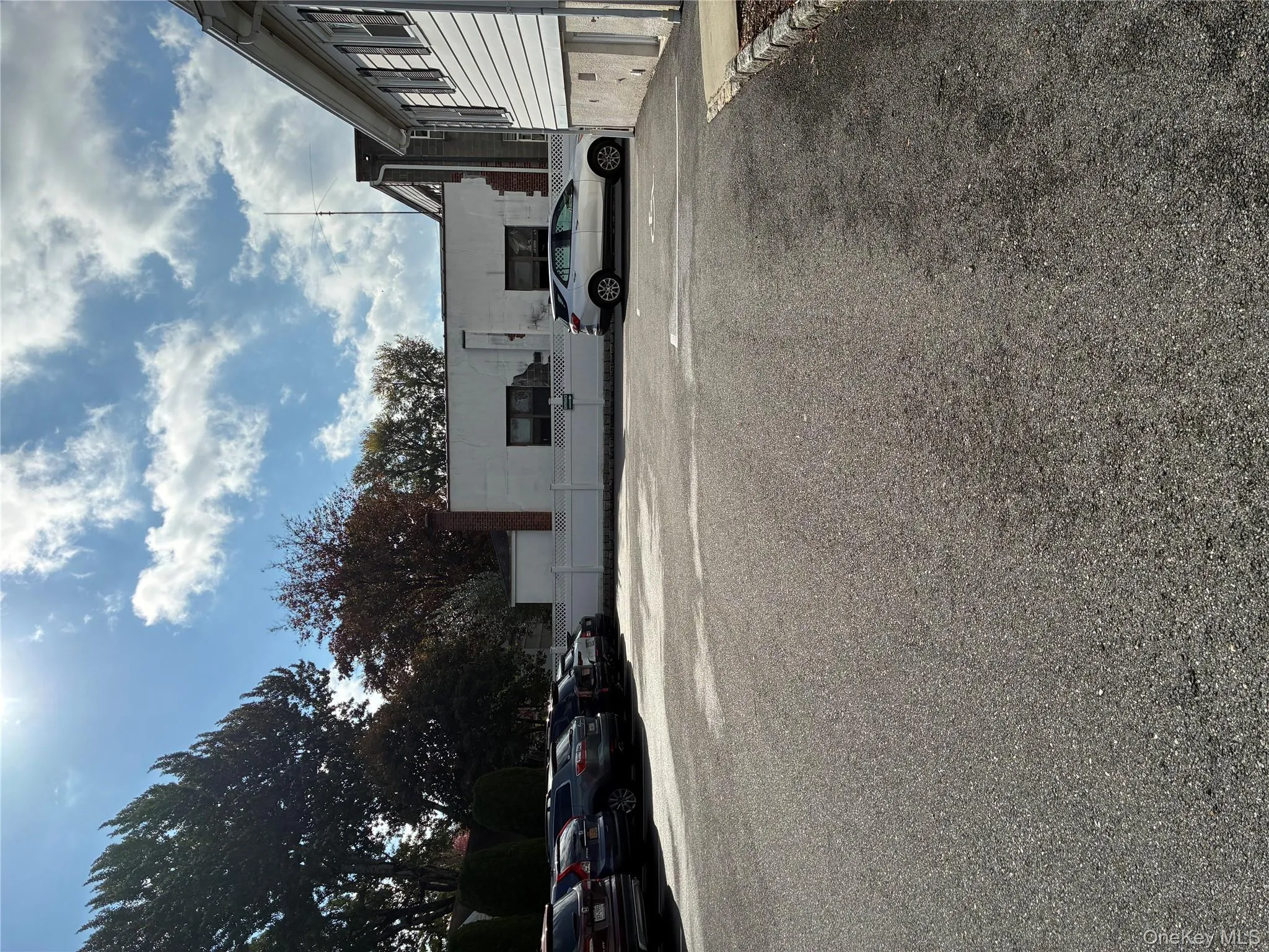 View of uncovered parking lot View of uncovered parking lot