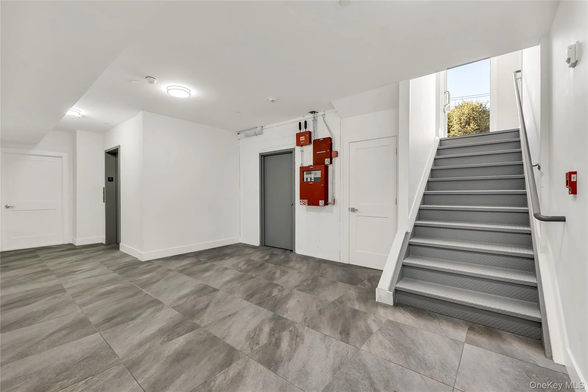 Stairway featuring baseboards Stairway featuring baseboards