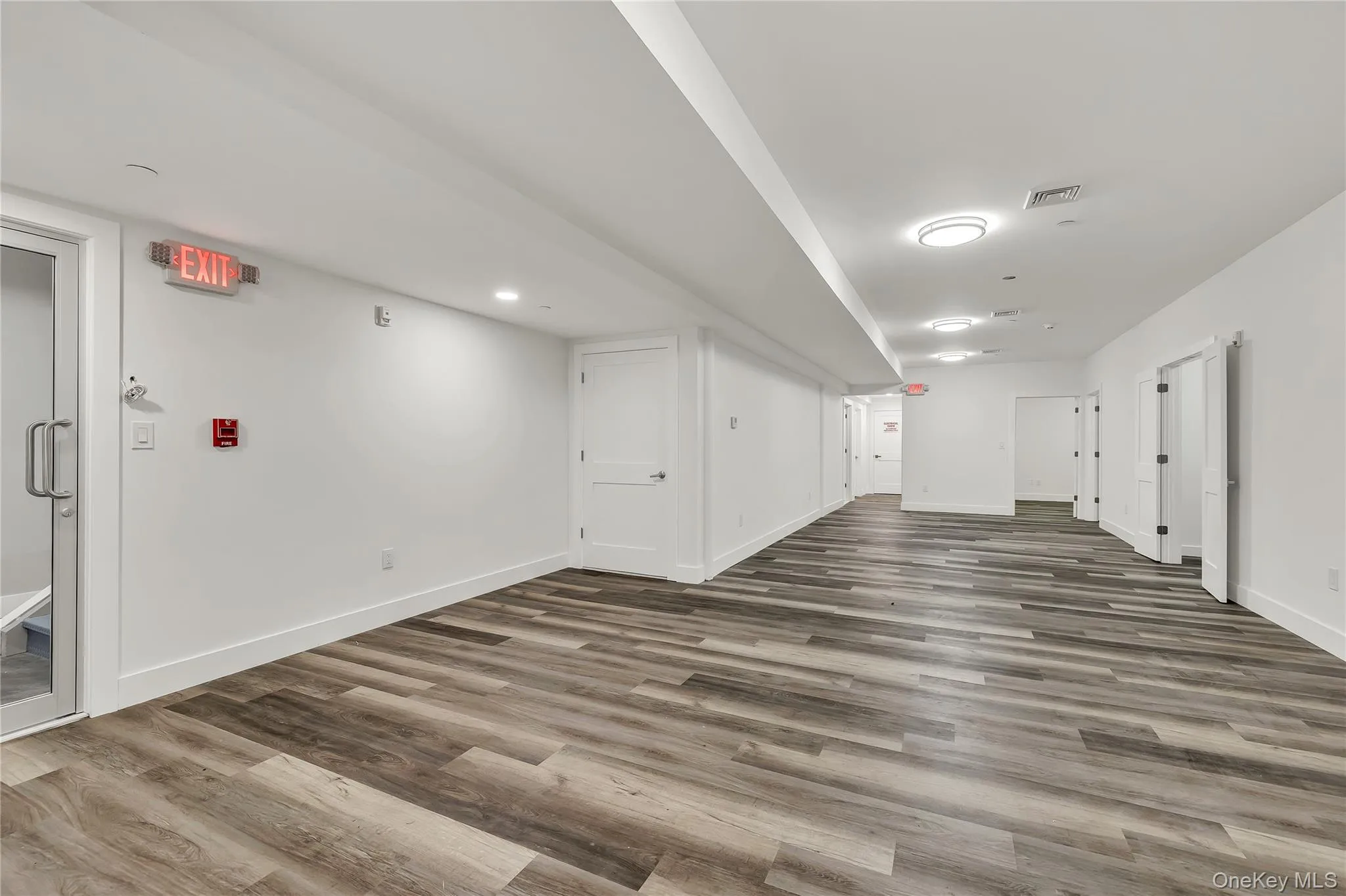 Finished below grade area with wood finished floors Finished below grade area with wood finished floors