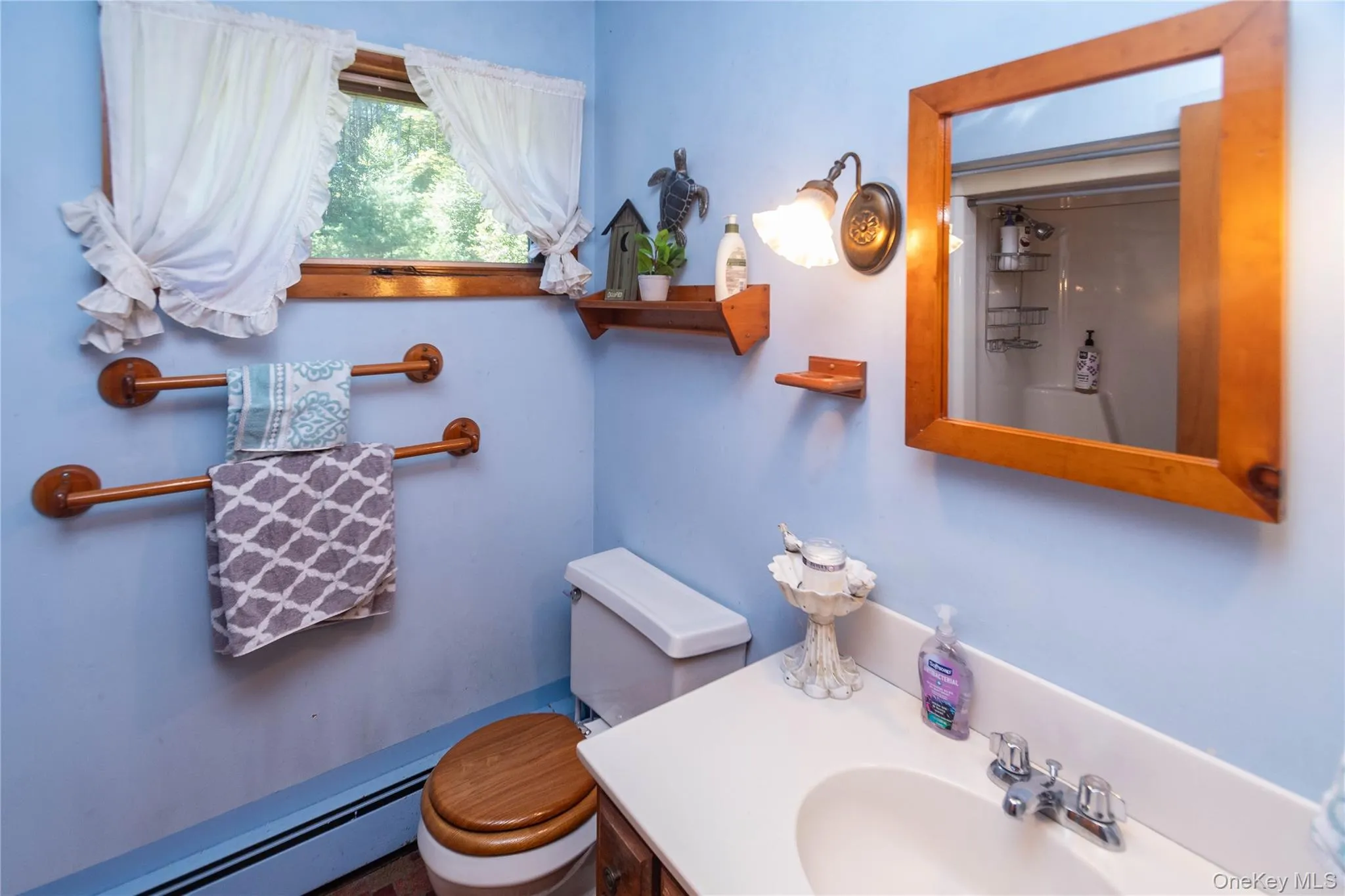 Full bath with vanity and toilet Full bath with vanity and toilet
