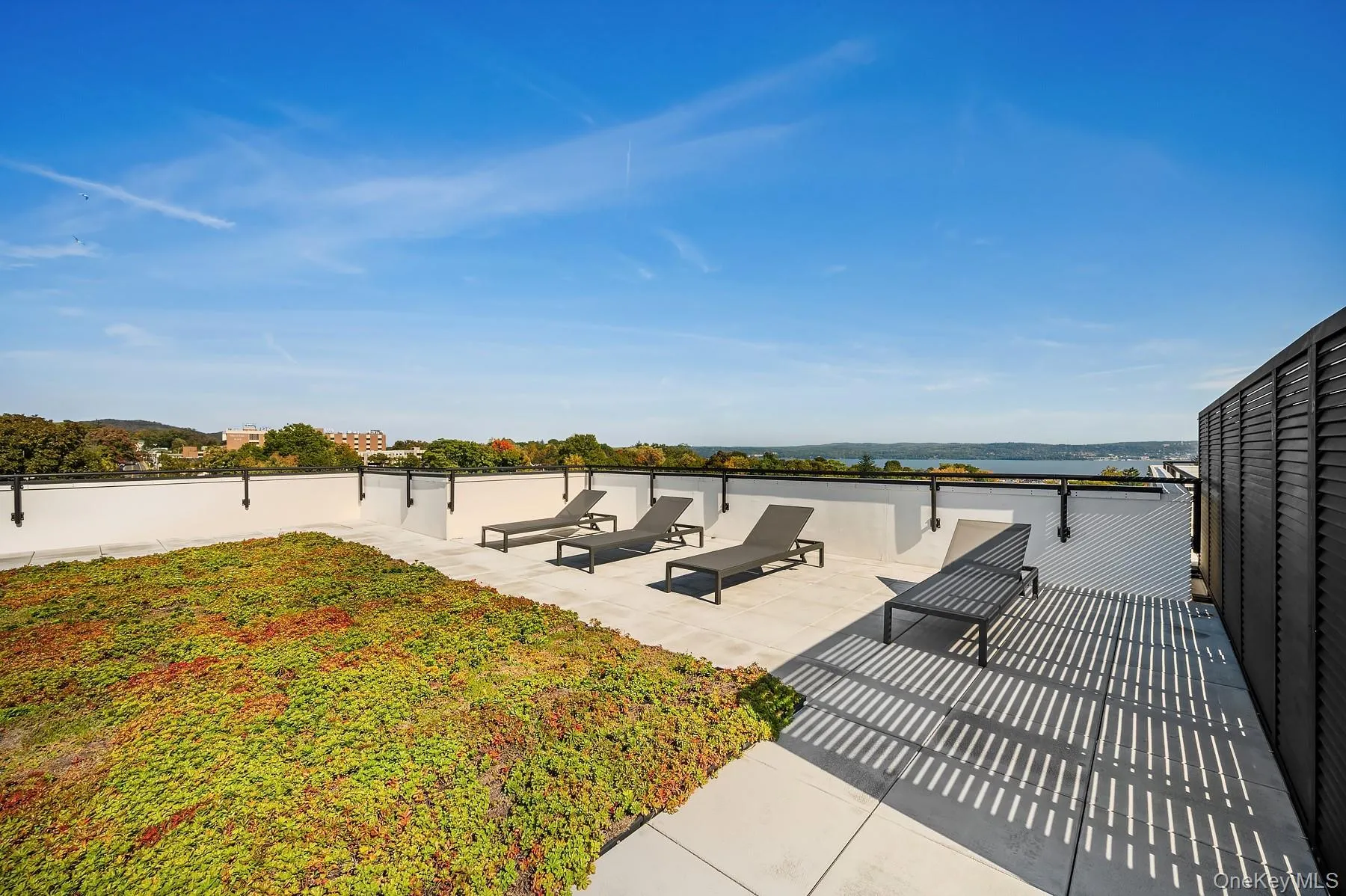 View of patio with a water view View of patio with a water view