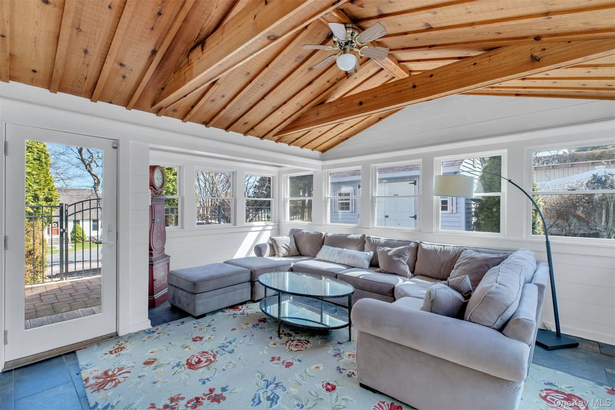 Sunroom featuring plenty of natural light Sunroom featuring plenty of natural light