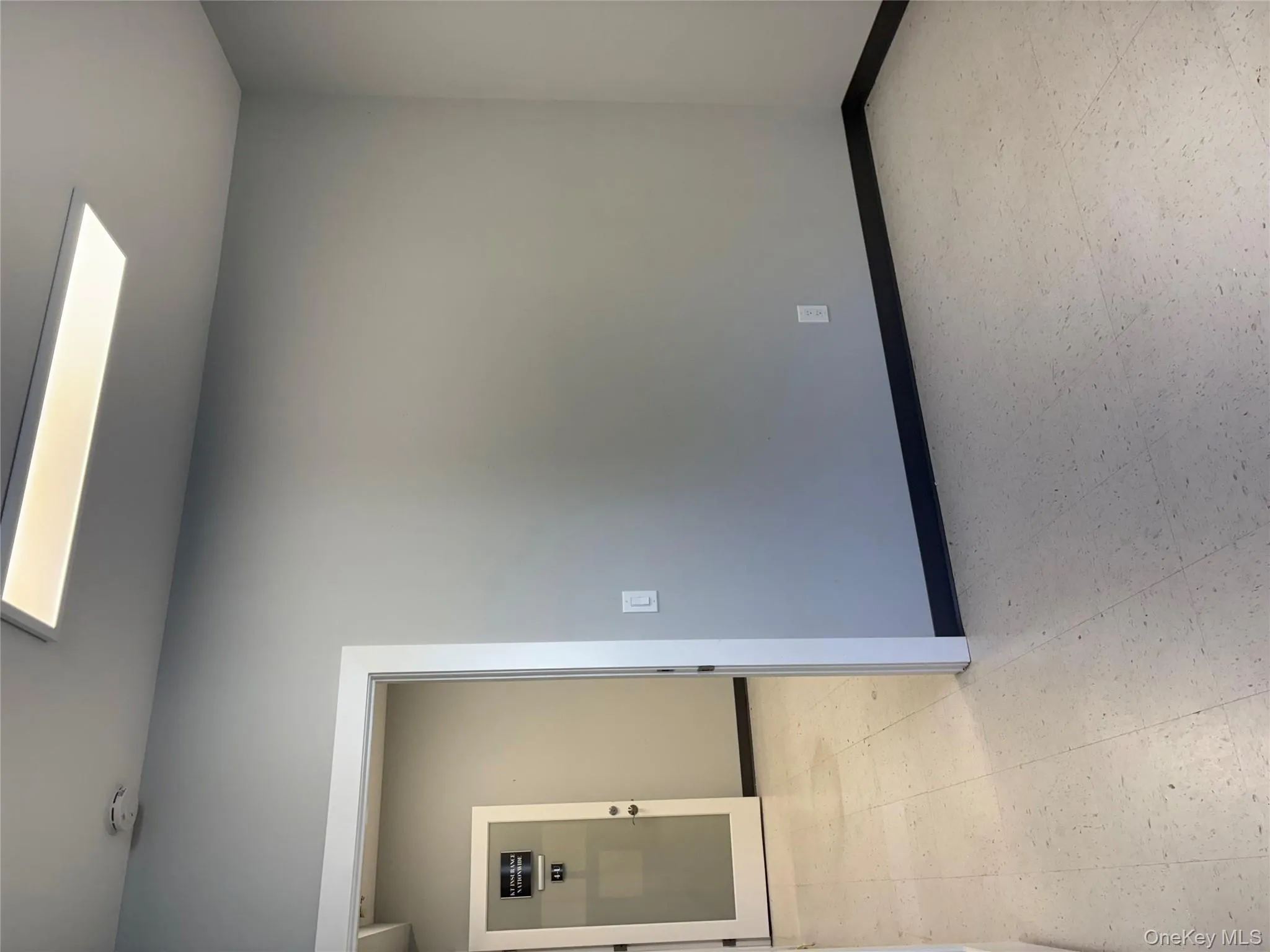 Unfurnished room featuring baseboards and light flooring Unfurnished room featuring baseboards and light flooring