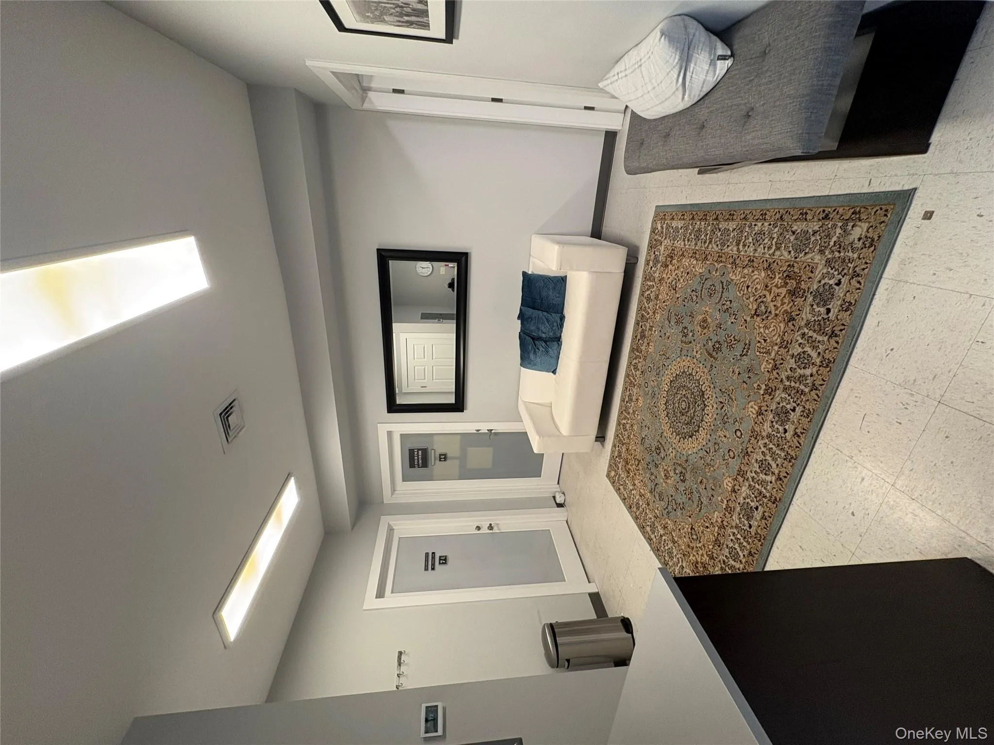 Living area featuring baseboards Living area featuring baseboards