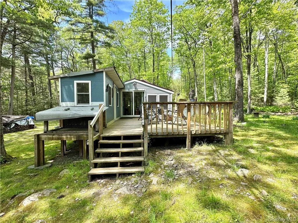 Deck featuring a yard Deck featuring a yard