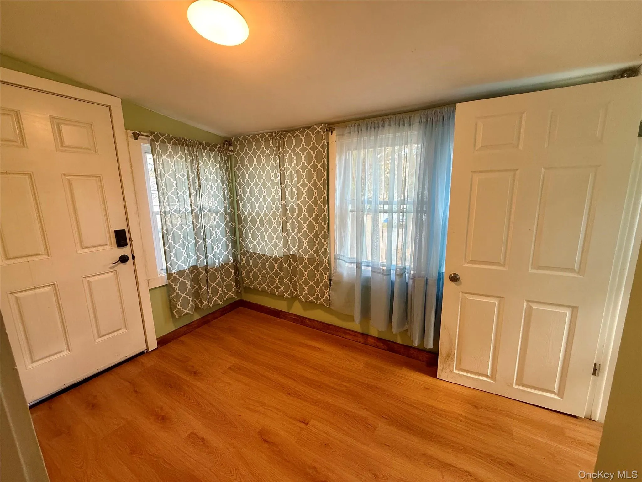 Spare room with light wood-style floors Spare room with light wood-style floors