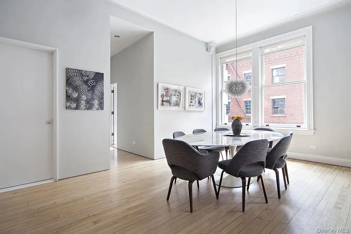Dining room featuring light wood-style floors Dining room featuring light wood-style floors