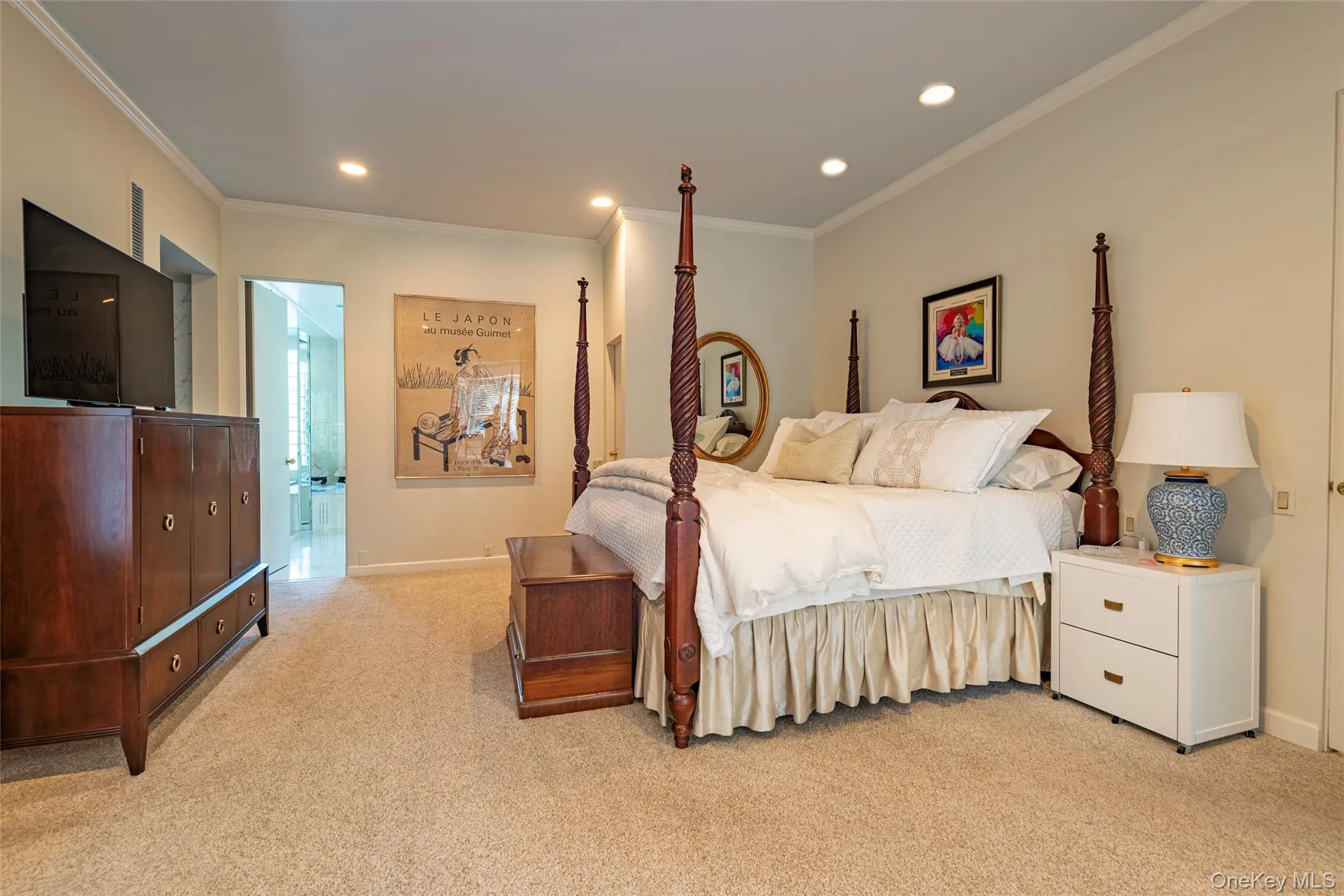 Bedroom featuring crown molding, light colored carpet, and recessed lighting Bedroom featuring crown molding, light colored carpet, and recessed lighting