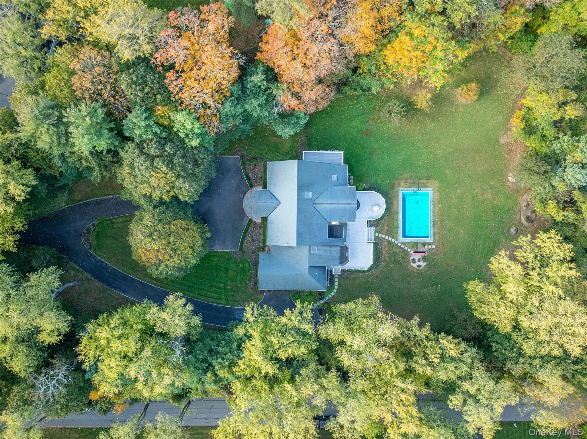 View of subject property with a pool View of subject property with a pool