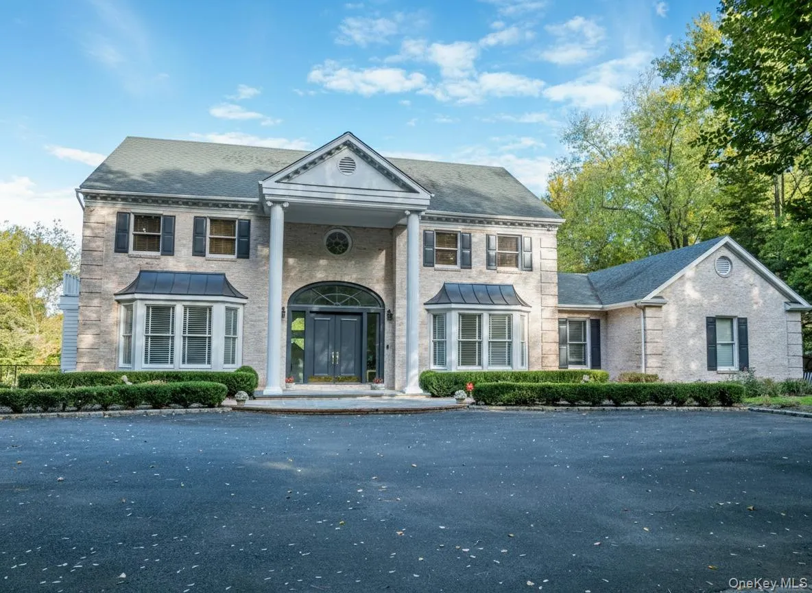 Greek revival house with brick siding Greek revival house with brick siding