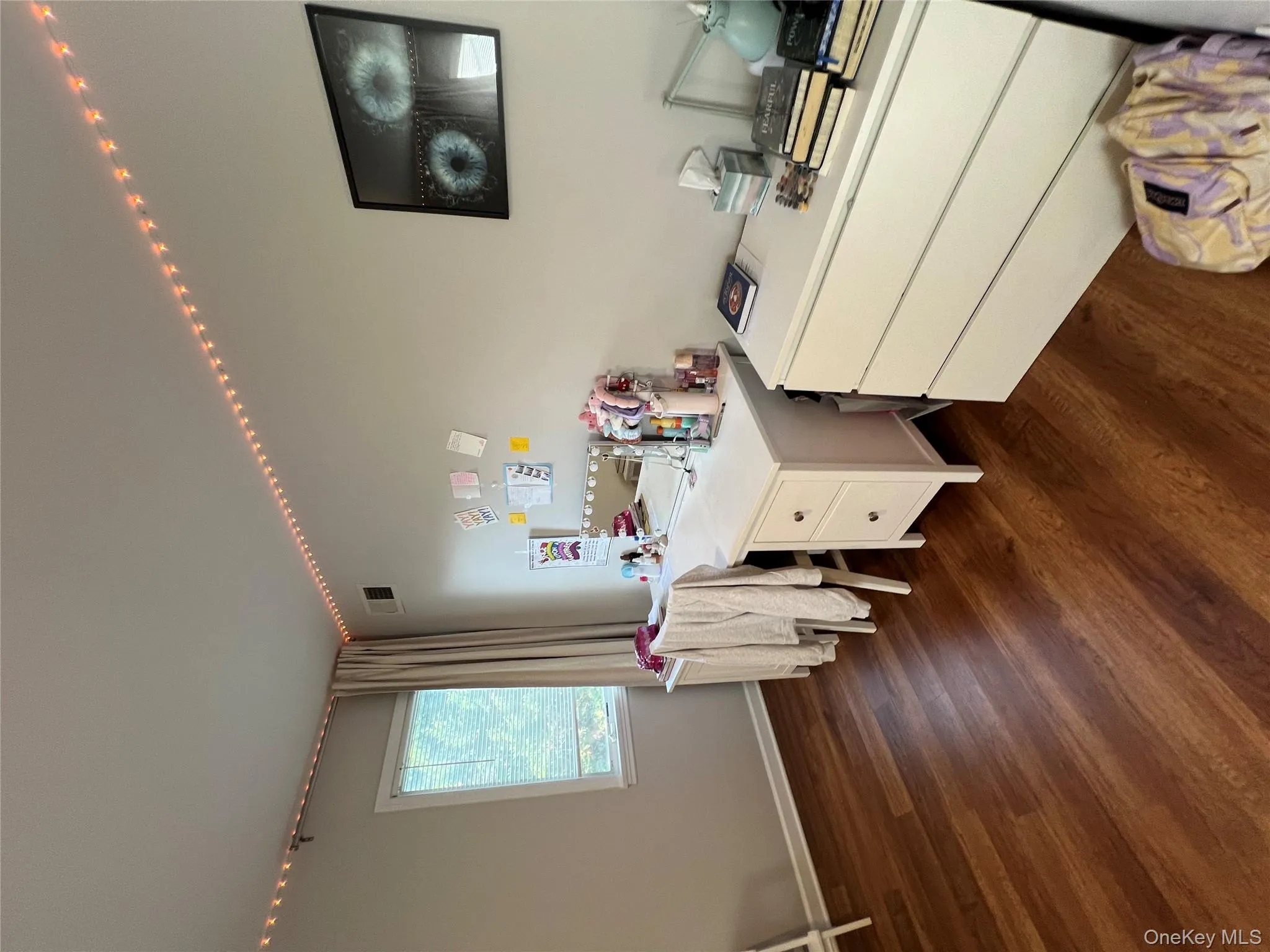 Office featuring dark wood-style flooring and baseboards Office featuring dark wood-style flooring and baseboards