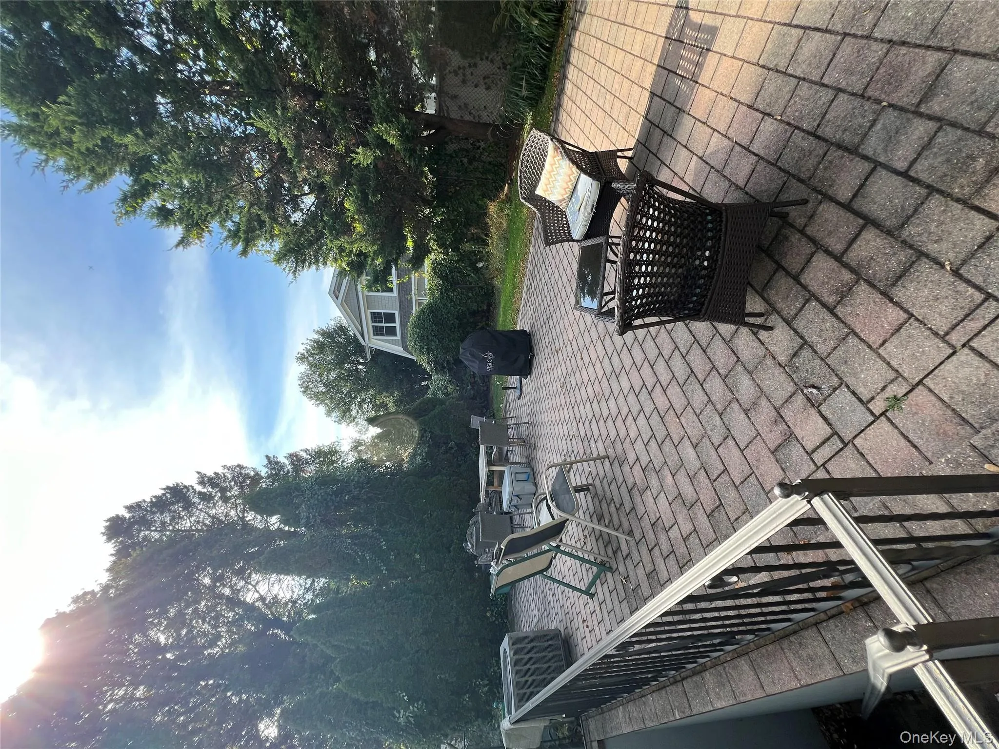 View of patio / terrace featuring outdoor dining area and grilling area View of patio / terrace featuring outdoor dining area and grilling area